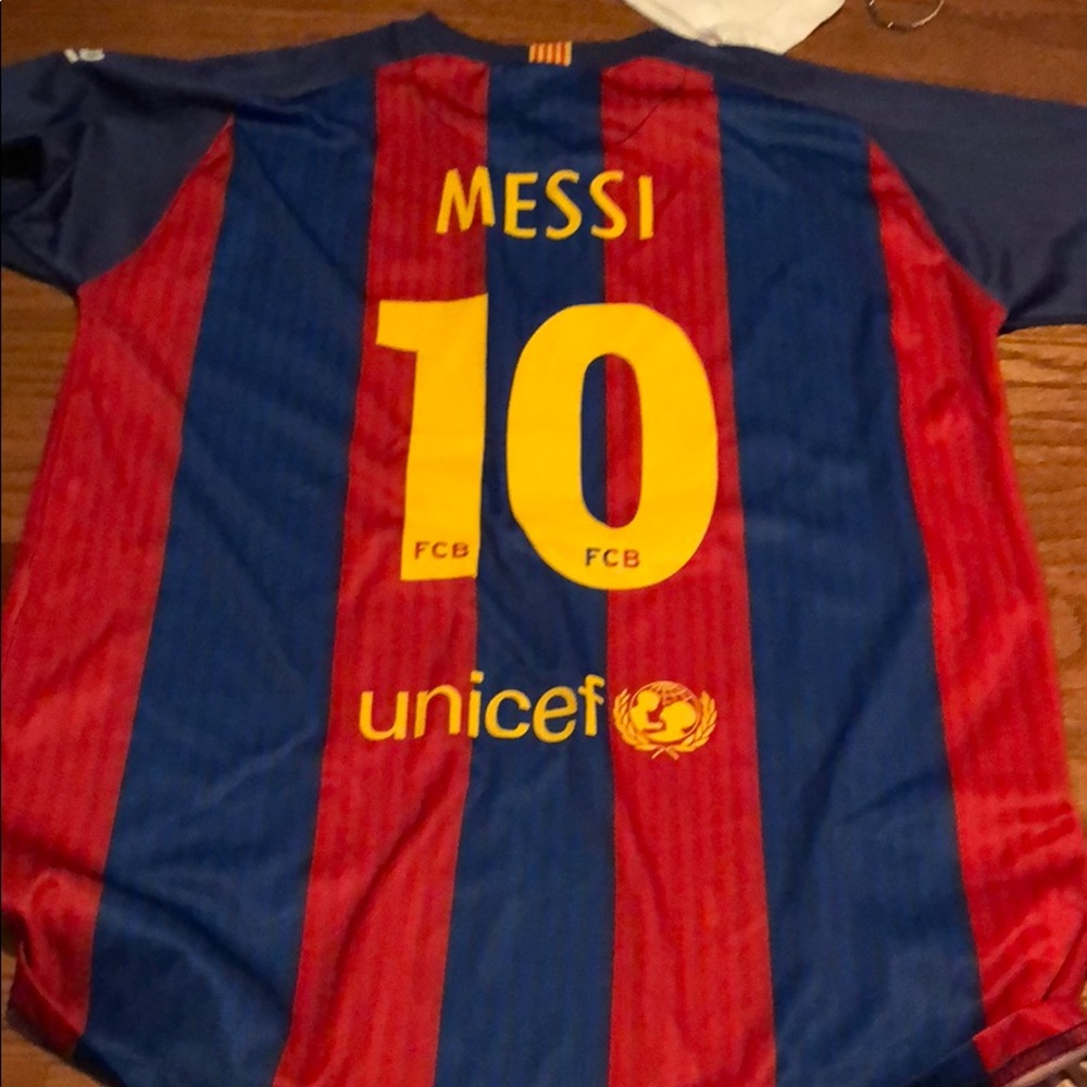 FCB MESSI JERSEY PURCHASED IN BARCA. NEVER WORN.